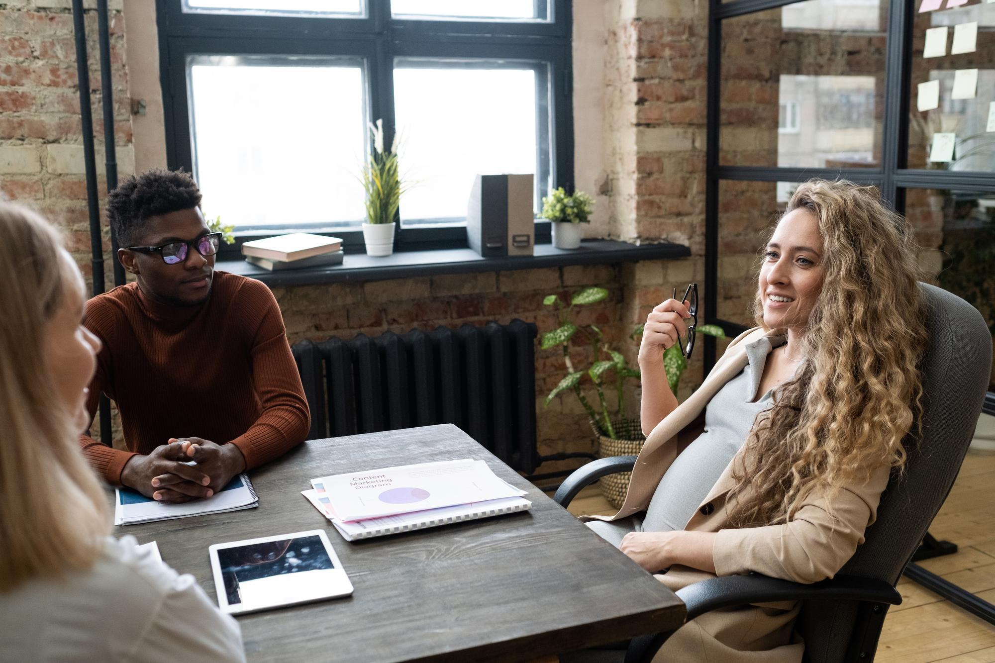 consultant speaking with client in refined office